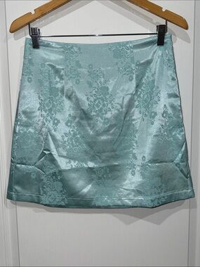 Princess Polly aqua blue satin mini skirt floral jacquard design size 6 NWOT